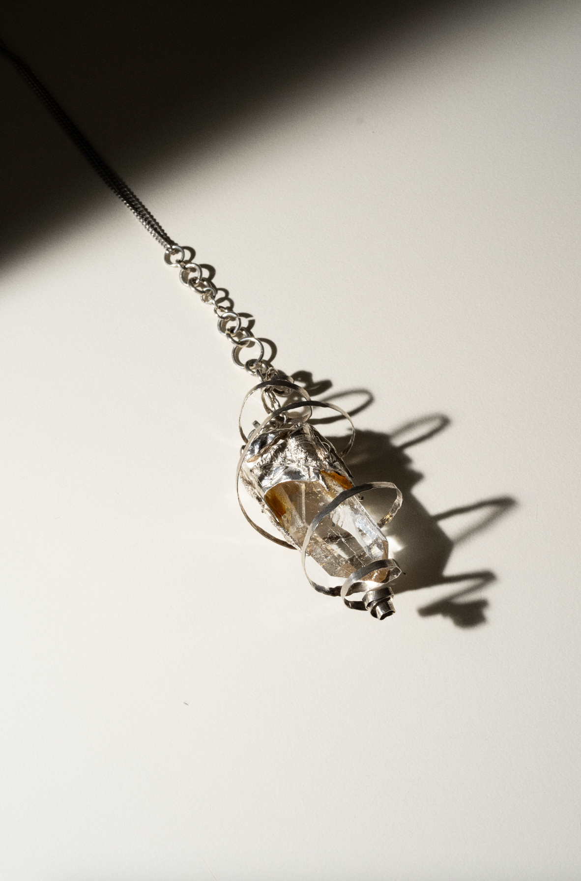 "Majestic Crystal Pendant on Twisted Silver Chain"