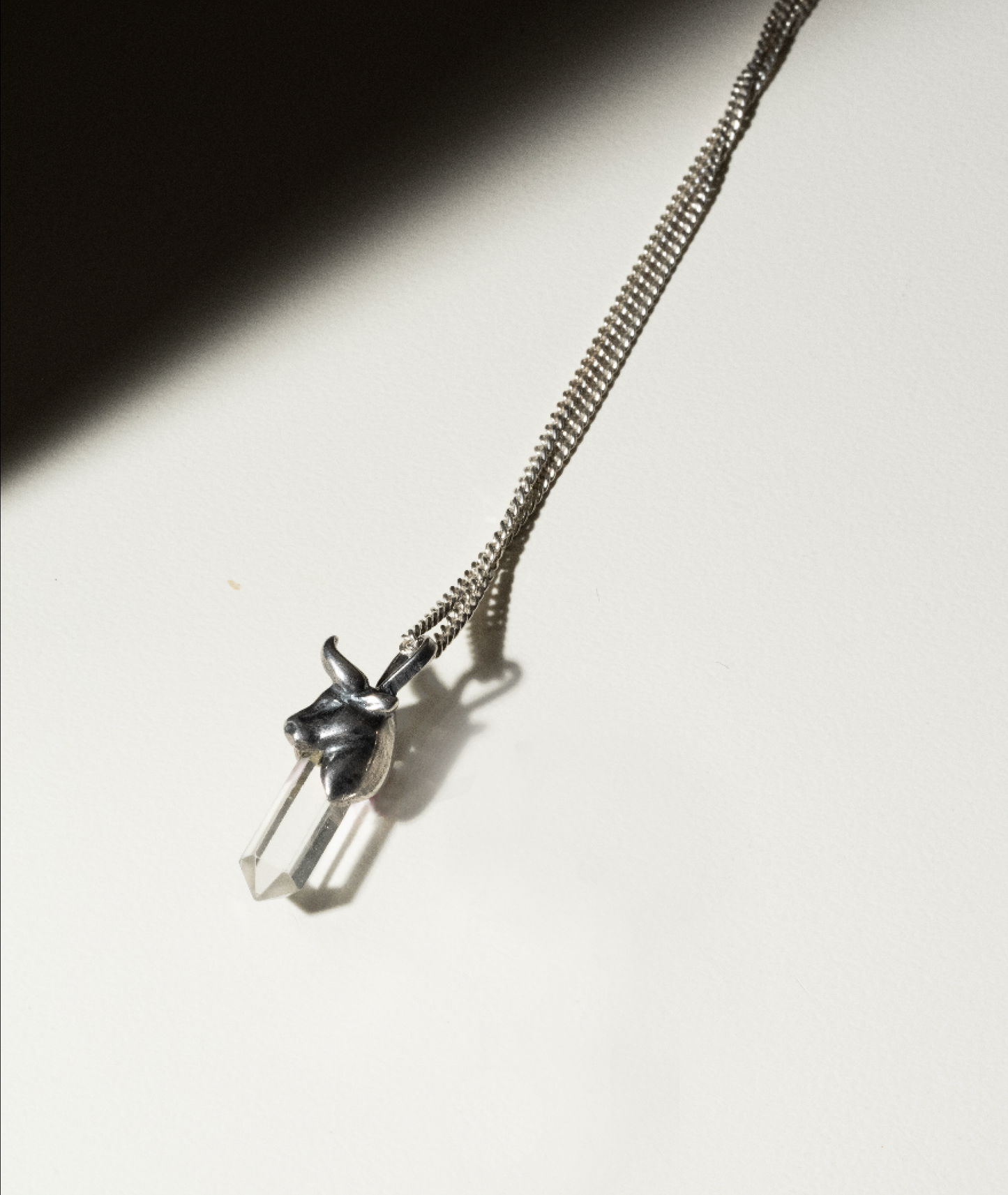 "Taurus Temptation: Dazzling Crystal Charm on Silver Chain"