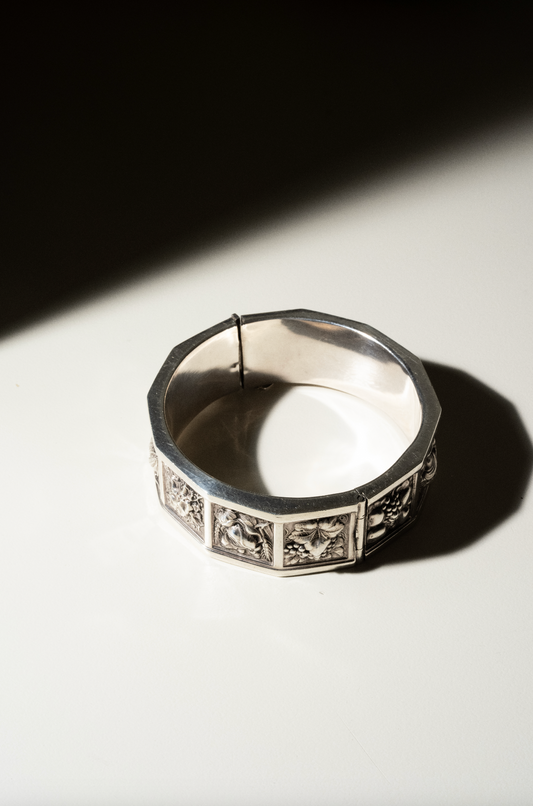 "1950s Handmade Silver Stamped Relief Bracelet Featuring Fruits and Vegetables"
