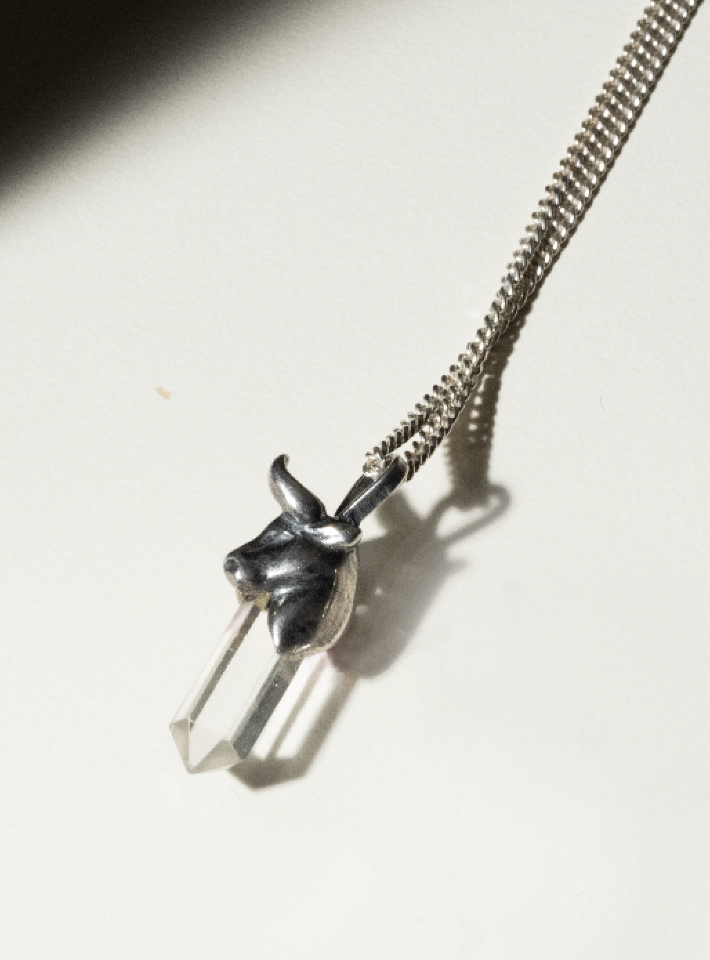 "Taurus Temptation: Dazzling Crystal Charm on Silver Chain"